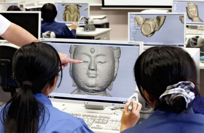 Sinh viên Nhật Bản đã tạo ra dữ liệu in 3D bằng cách điều chỉnh dữ liệu 3 chiều được quét bằng máy quét 3 chiều. Ảnh: Nhật báo Yomiuri Shimbun.